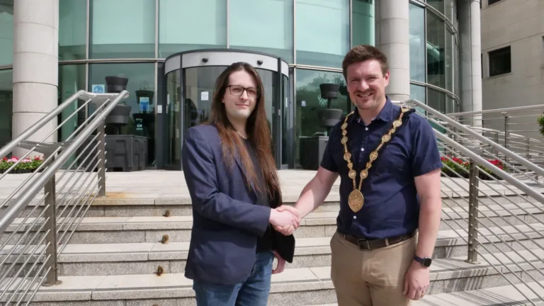 Conor shaking Lisburn mayor's hand